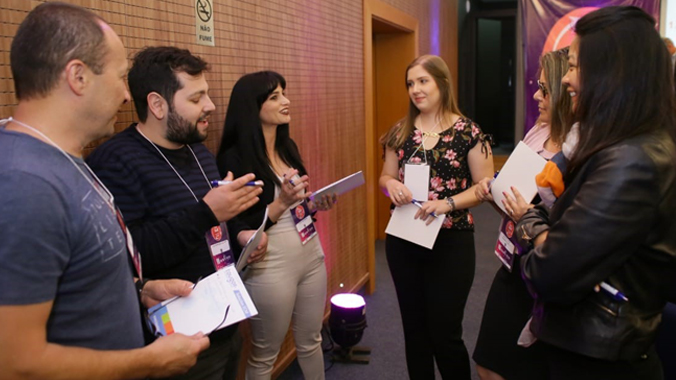 Convenção ECM 360º, participantes trocam ideias e criam estratégias de sucesso.